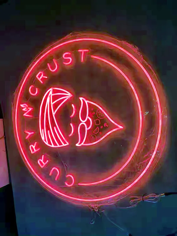 Custom LED neon logo for Curry n' Crust fabricated by Win Signs