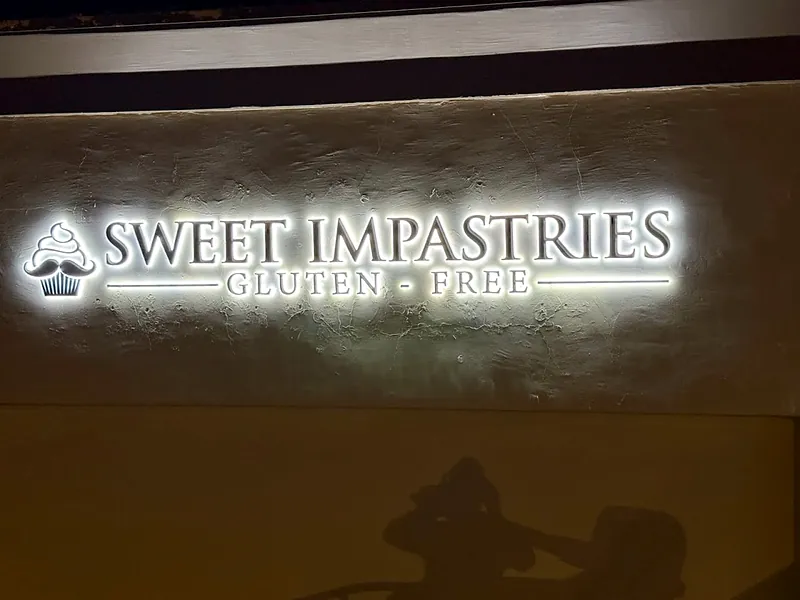 Halo-lit reverse channel letters for Sweet Impastries in Gilbert, AZ by Win Signs